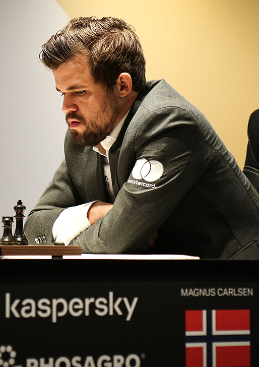 Magnus Carlsen at the board during the 2021 World Chess Championship in Dubai